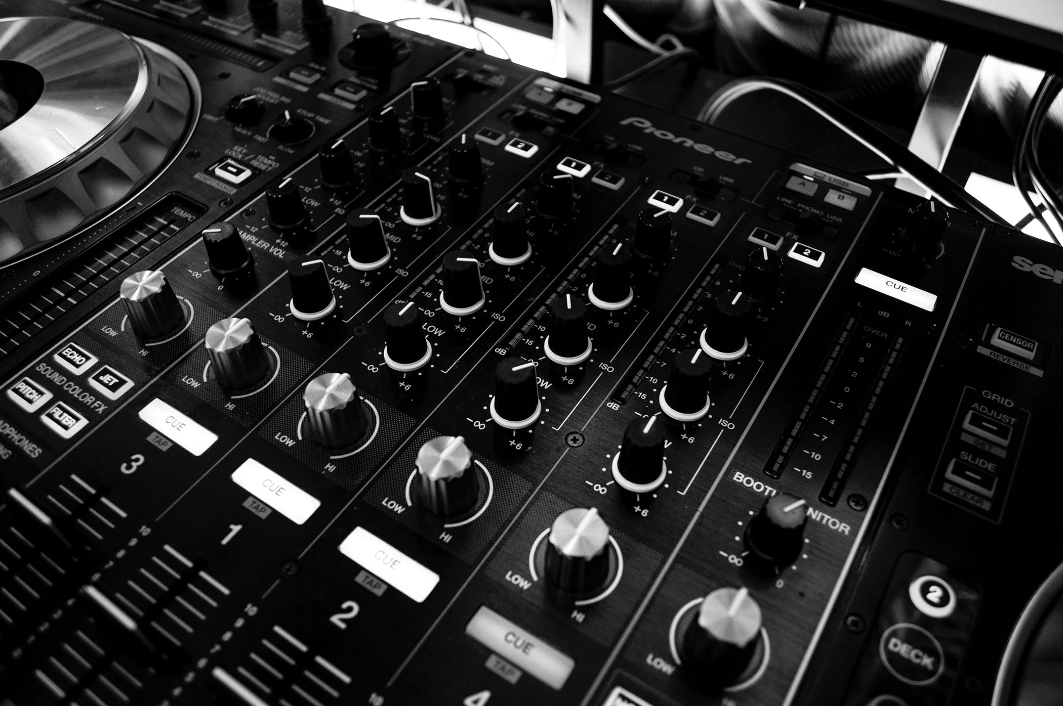 black and white picture of a DJ mixer